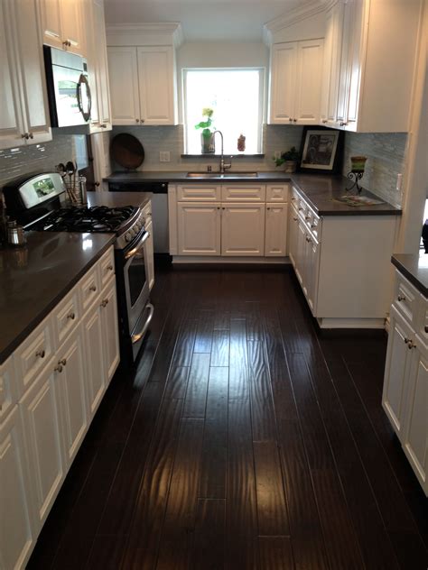 dark cabinets white floors and stainless steel|black floor white cabinets kitchen.